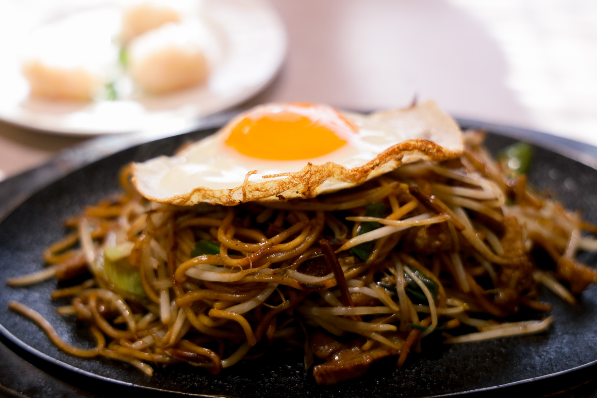 Yakisoba topped with a fried egg
